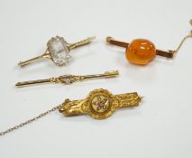 A 750 yellow metal and single stone diamond set bar brooch, 53mm, gross weight 2 grams and three