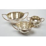 A George V silver sugar bowl and cream jug, Barker Brothers Silver Co, Birmingham, 1933 & 1937 and