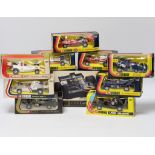 Ten boxed Corgi racing cars, Including: 1:18 scale J.P.S. Lotus Formula 1 (190), Yardley McLaren