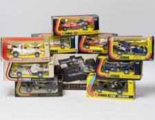 Ten boxed Corgi racing cars, Including: 1:18 scale J.P.S. Lotus Formula 1 (190), Yardley McLaren