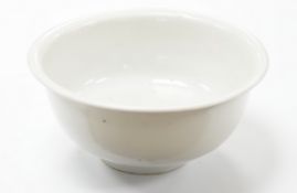 A Chinese late Ming white glazed bowl, underglaze blue seal mark, 14cm in diameter