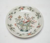 A Chinese famille verte saucer dish, Xuande mark, Kangxi period, 16cm diameter