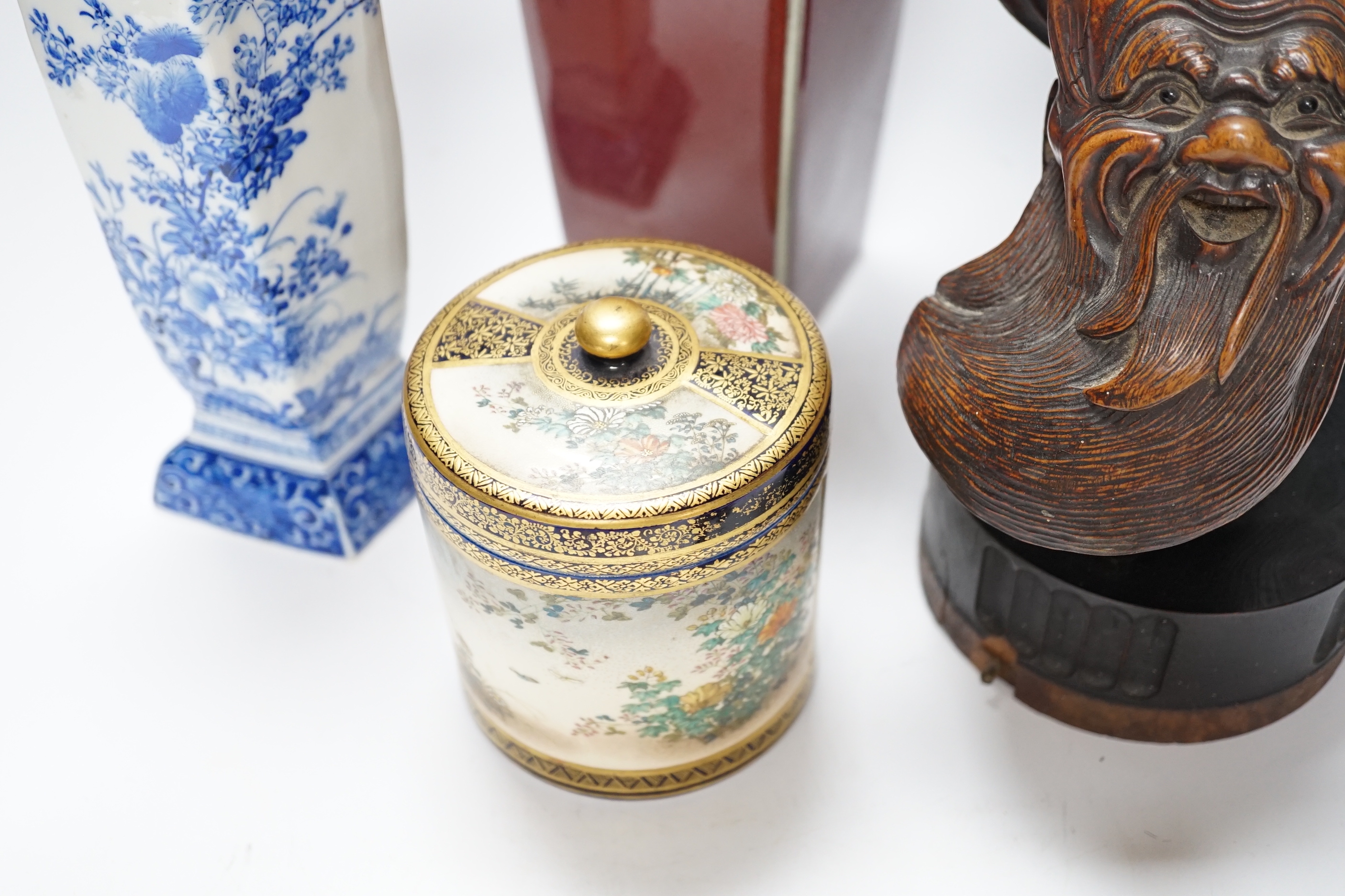 A Chinese sang-de-boeuf vase, a hongmu head, a Japanese Satsuma jar, a blue and white vase, and a - Image 13 of 18