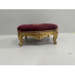 A Victorian carved giltwood footstool, width 36cm, height 16cm