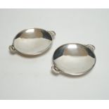 A pair of small 1930's Georg Jensen sterling dishes, with fluted lug handles, 94mm.