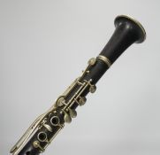 An unmarked wooden clarinet