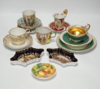An Austrian chocolate cup and saucer, a similar trio, a BFB Worcester cup and saucer, a pair of