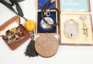 A group of 19th century and later collectibles to include a silver plated presentation padlock and