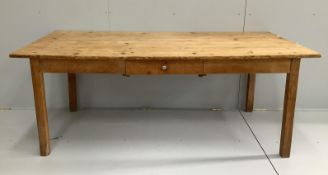 A 19th century French rectangular pine kitchen table, length 192cm, width 90cm, height 74cm