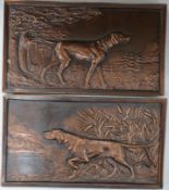A pair of cast metal plaques of retrievers, 21 x 37cm