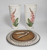 A pair of French opaque white glass vases enamelled with foxgloves, a plated bread board and a