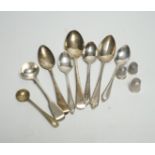 A small quantity of silver condiments and teaspoons, three silver thimbles and a sterling thimble.