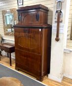 An early 19th century Berlin Beidermeier mahogany and parcel ebonised secretaire, in the manner of