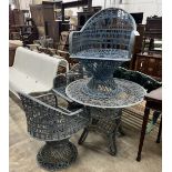 A Russell Woodard fibreglass garden table, diameter 89cm, height 70cm and three chairs,