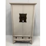 A Chinese elm two door side cabinet, later painted, width 99cm, depth 64cm, height 180cm