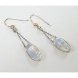 A pair of yellow metal, oval cabochon moonstone and round cut sapphire set drop earrings, 30mm,