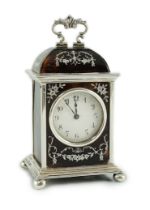 A George V silver and tortoiseshell pique mounted carriage timepiece, by William Comyns, with Arabic