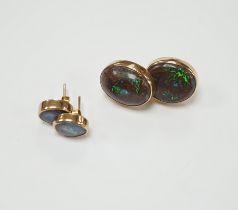 Two pairs of yellow metal and oval opal doublet set earrings, the smaller stamped 9ct, largest 17mm,