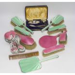 A 1930's five piece silver and green enamel mounted mirror and brush set by Mappin & Webb, a 1920'