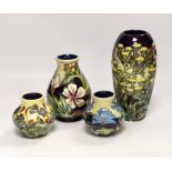 Two squat Moorcroft vases and two larger vases, tallest 19cm high