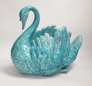 A large turquoise majolica swan, 31.5cm