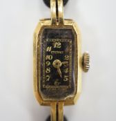 A lady's 1930's 18ct gold Eterna manual wind wrist watch, on a twin strand fabric strap with gold