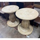 A pair of contemporary American circular carved wood centre tables, diameter 64cm, height 75cm