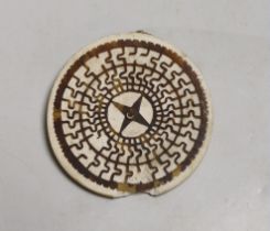 A Solomon Islands shell and tortoiseshell kapkap parure (pendant), 8.5cm., losses. Provenance: a