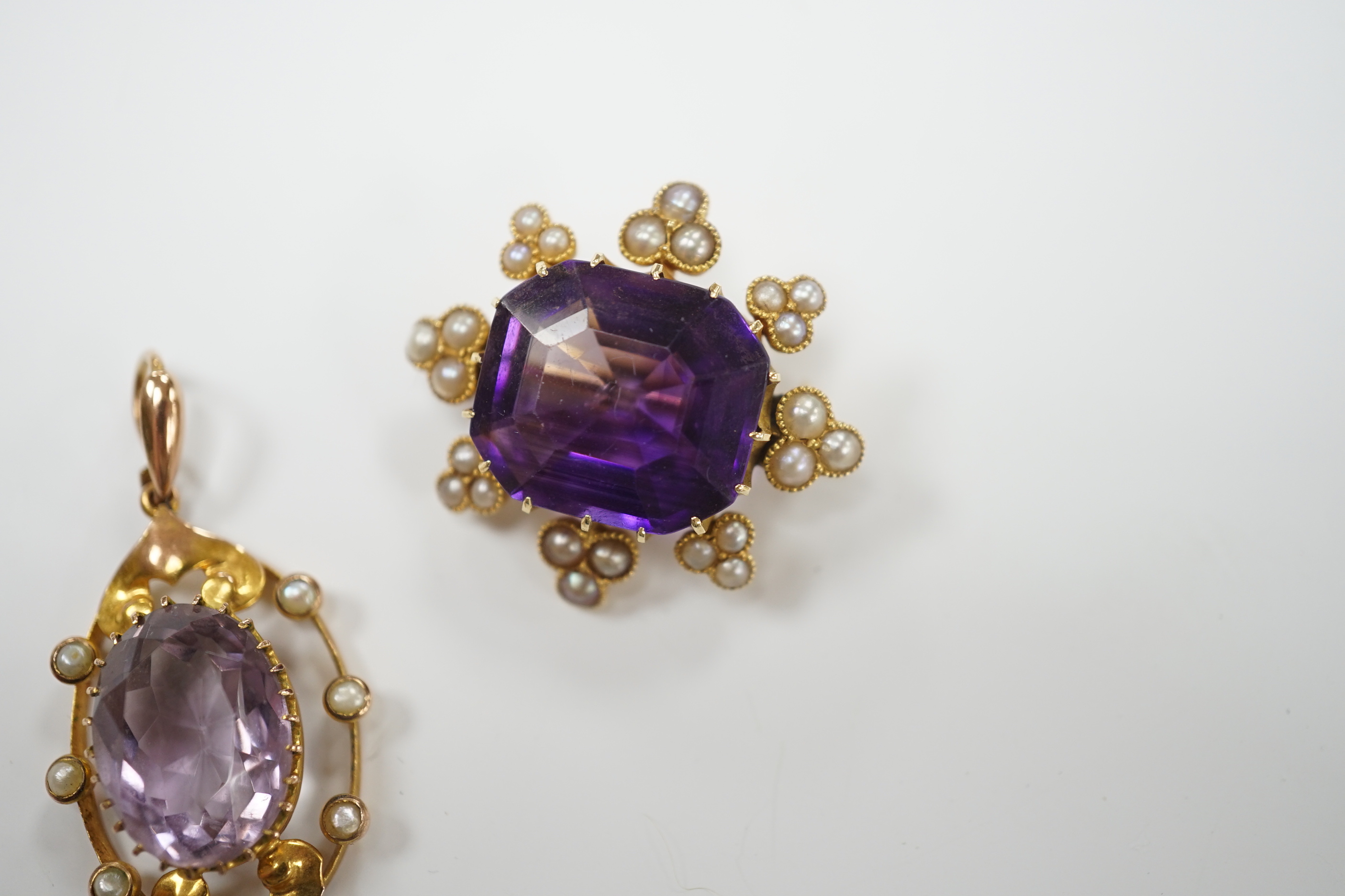 An early 20th century yellow metal, amethyst and seed pearl set brooch, 26mm and a similar - Image 3 of 6