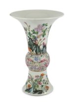 A Chinese famille rose beaker vase, gu, late Qing / early Republic period finely painted with two