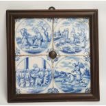 Four framed 19th century Delft ‘bible story’ tiles, 31cm x 31cm