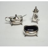 A Elizabeth II three piece silver condiment set by Elkington & Co, Birmingham, 1964/65, with