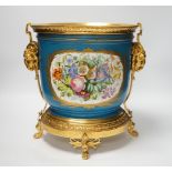 A late 19th century Sevres style jardiniere, turquoise ground with gilt rams head metal mounts, 28cm