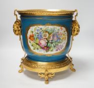 A late 19th century Sevres style jardiniere, turquoise ground with gilt rams head metal mounts, 28cm