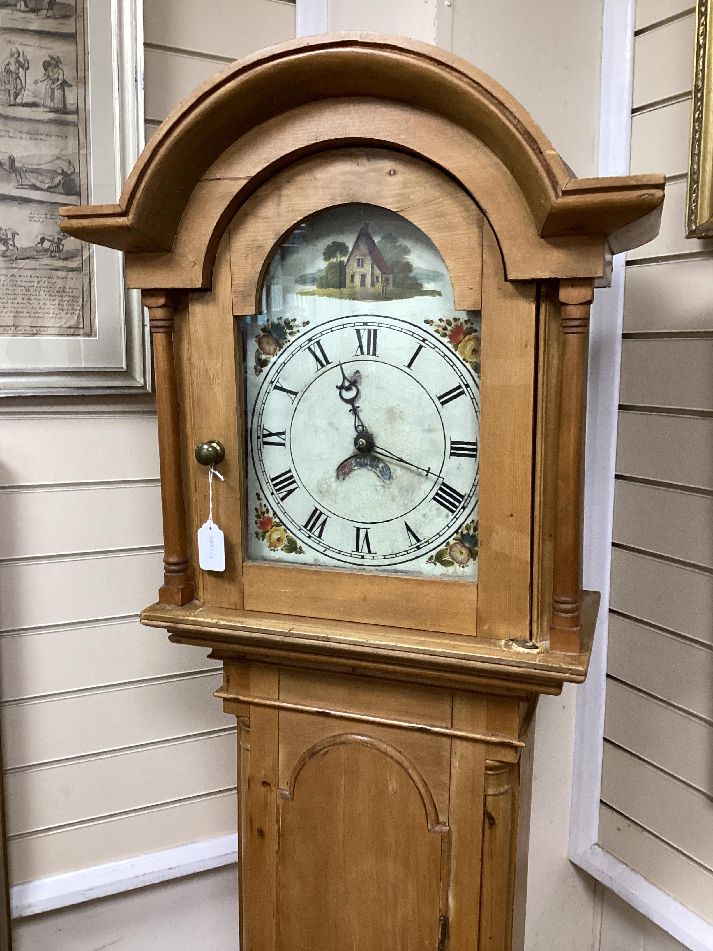 A 19th century pine thirty hour longcase clock with painted arched dial, height 191cm