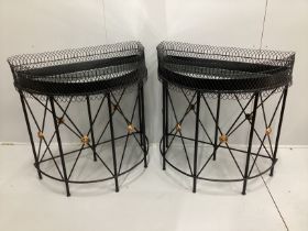 A pair of contemporary wrought iron and wirework 'D' shaped console tables with mirrored tray