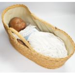 An Armand Marseille mulatto My Dream Baby bisque doll, mould 341