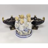 A Volkstedt porcelain figure group of children dancing together with two urns and covers (3), figure