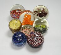 Eight Scottish or Chinese glass paperweights