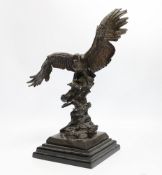 After Pierre-Jules Mêne (1810 - 1879), a bronze model of a perched eagle, 34cm