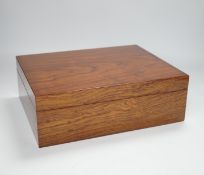 A modern wooden humidor with inset humidity measure, 29cm x 23cm x 9.5cm