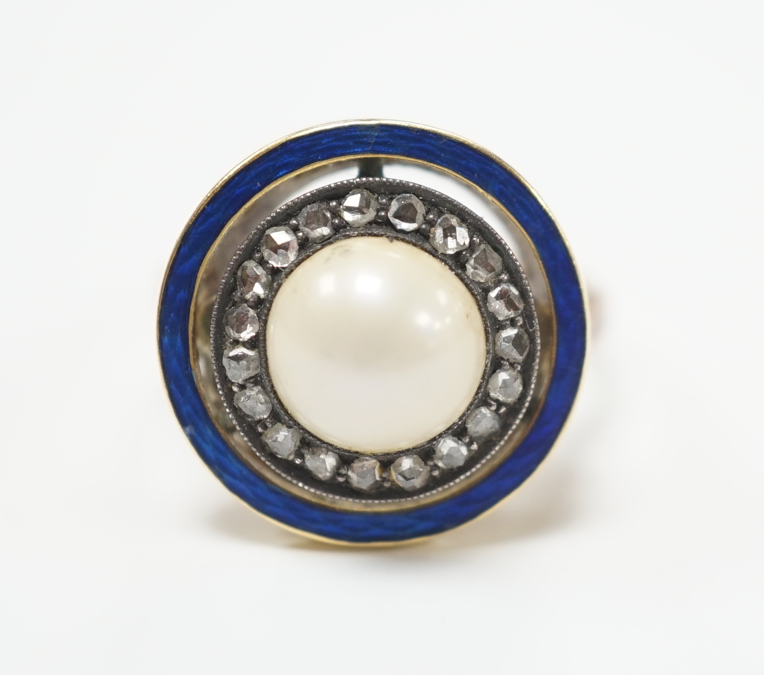 An early to mid 20th century yellow metal, split pearl, rose cut diamond chip and blue enamel set