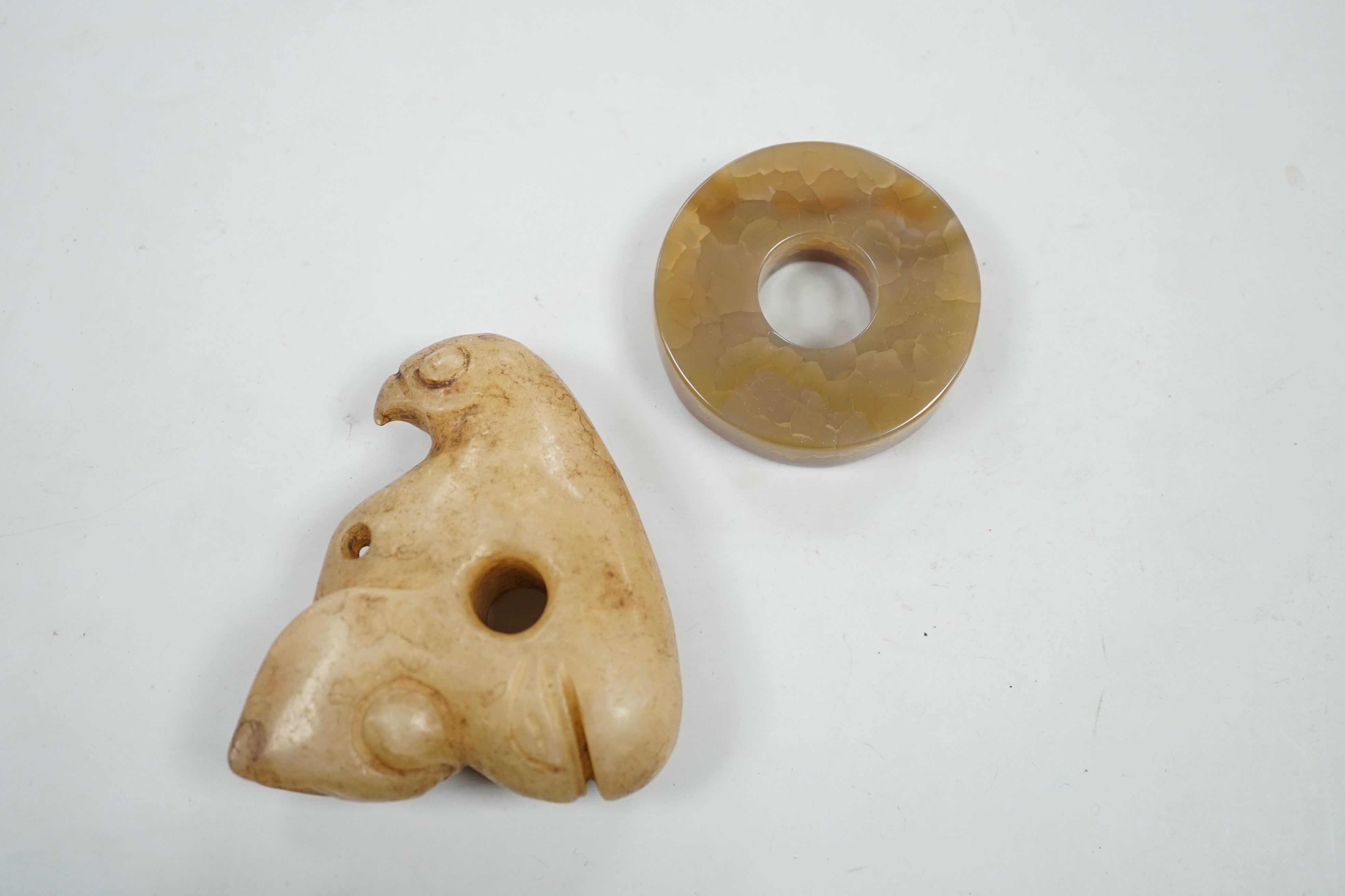 A Chinese agate bi disc and an archaistic jade eagle, 8.5cm - Image 4 of 5