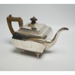 A George III silver shaped square teapot, by Urquhart & Hart, London, 1805, on bracket feet, gross