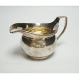 A George III silver cream jug, Richard Cook, London, 1802, 6.3oz.