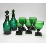 A pair of small Bristol green decanters, Rum and Hollands, c.1800 and five 19th century green