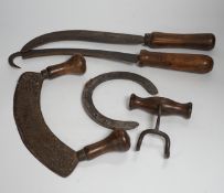 An assorted collection of used 20th century horticultural, shoe making and cooking tools,