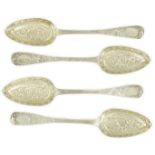 A cased set of four late George III embossed and engraved parcel gilt silver Hanovarian pattern