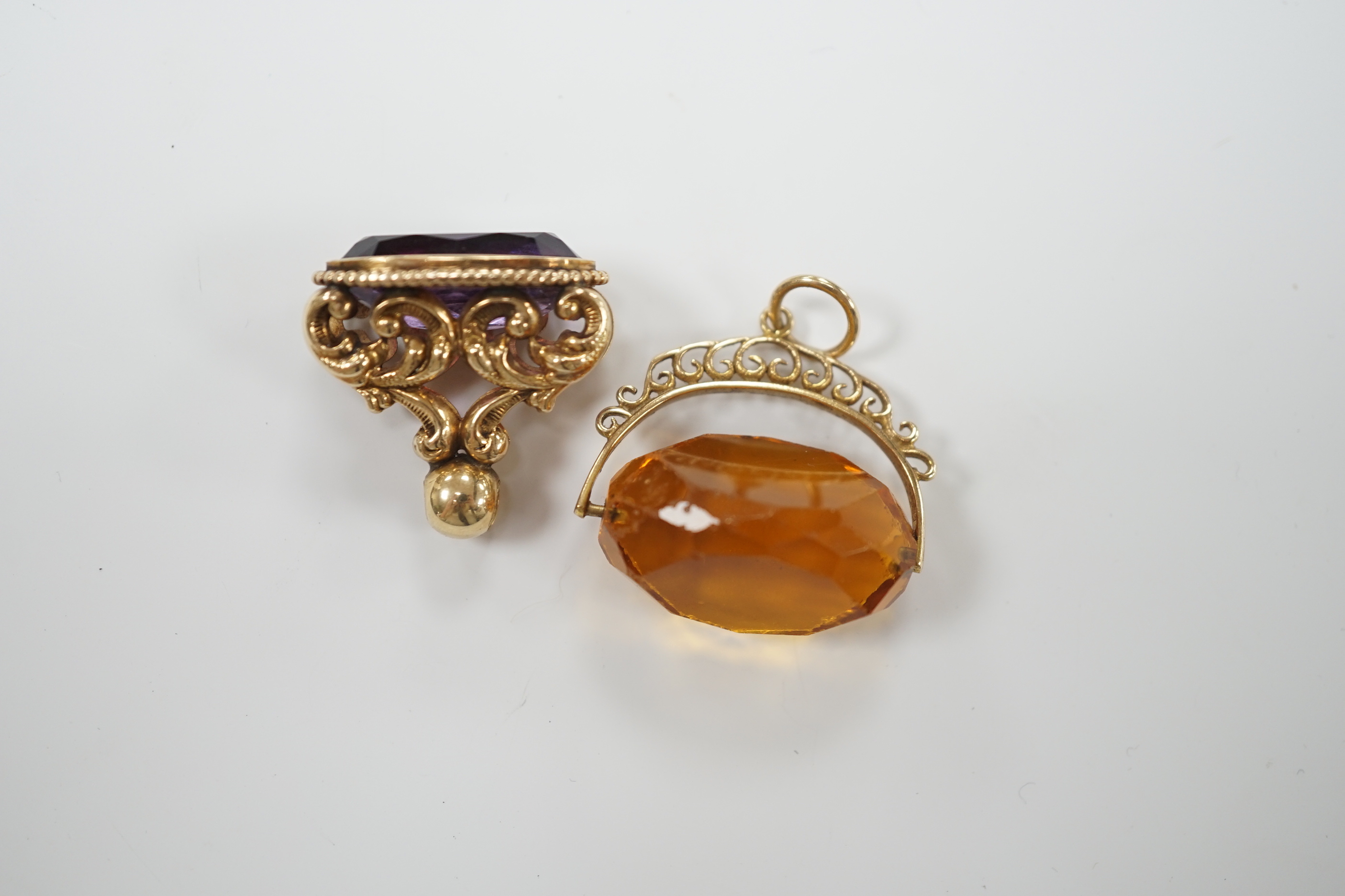 A yellow metal and amethyst set spinning fob, 22mm and one other 9ct gold and gem set fob, gross - Image 4 of 4