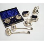 A cased pair of silver salts, one other pair of salts, a Guernsey miniature silver milk jug, an